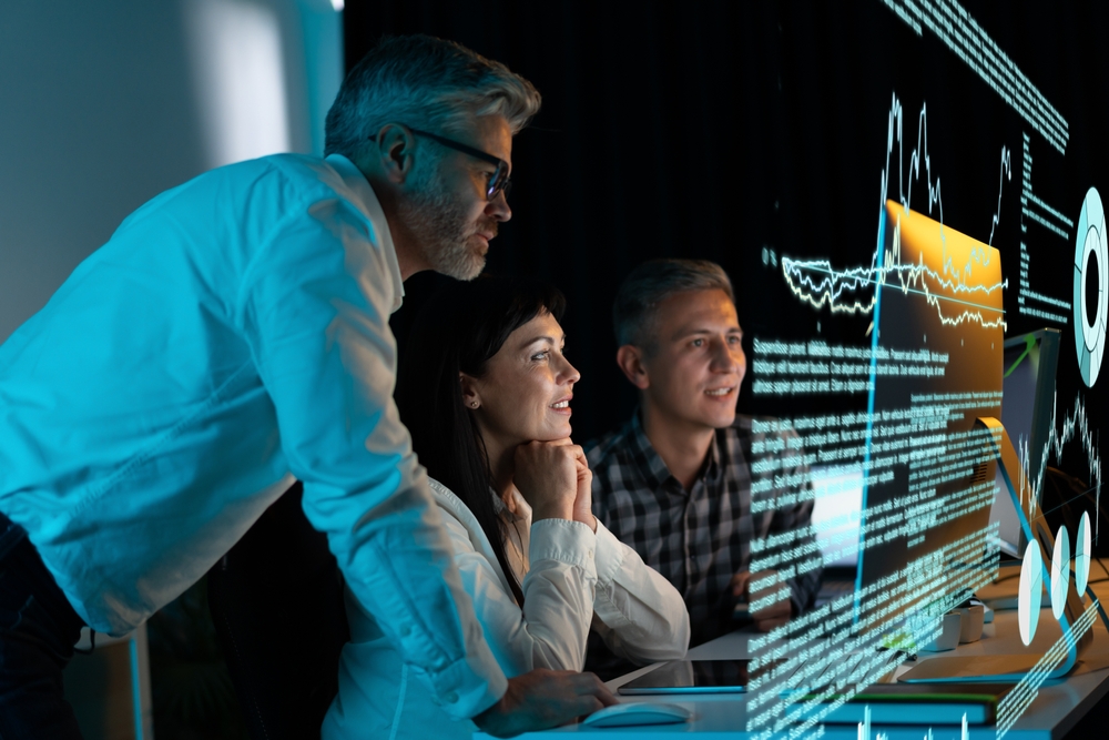 Business People looking at Screen